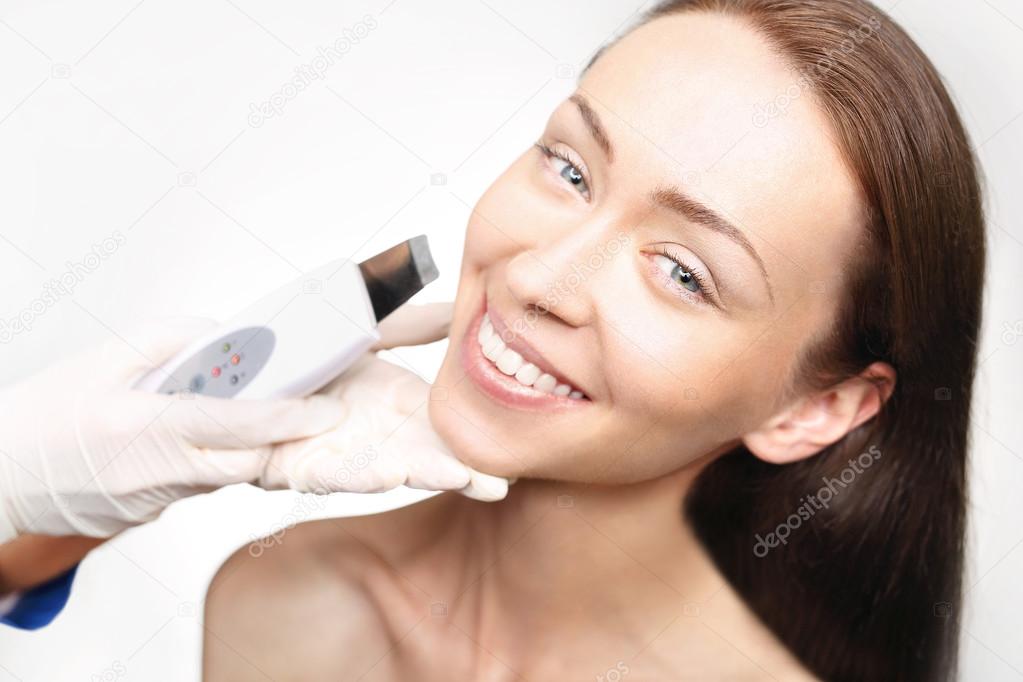 peeling, ultrasound, woman at vanity