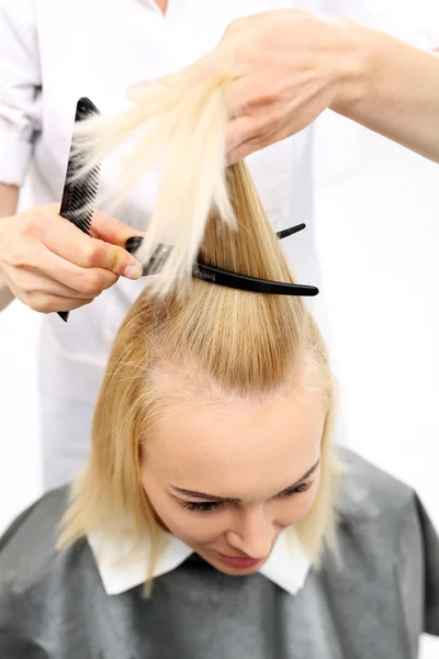 Combing hair — Stock Photo, Image