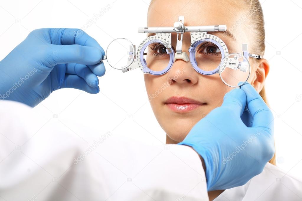 Selection of spectacles, woman ophthalmologist.