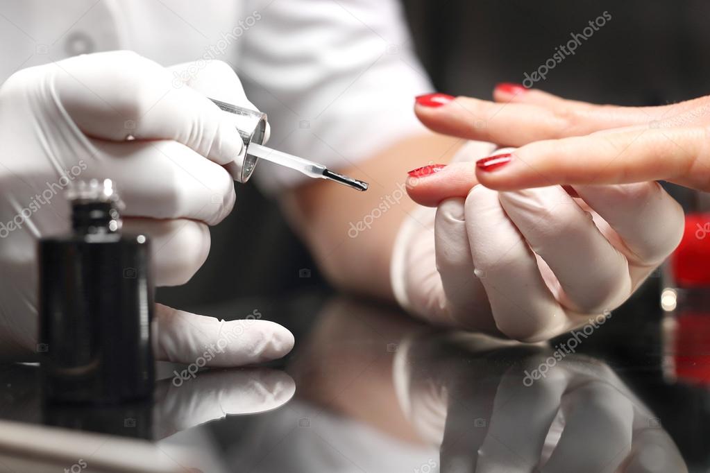 Decoration on the nails, manicure salon