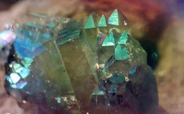Beautiful crystal magic Quartz gem stone. Iridescent natural geometric crystals.