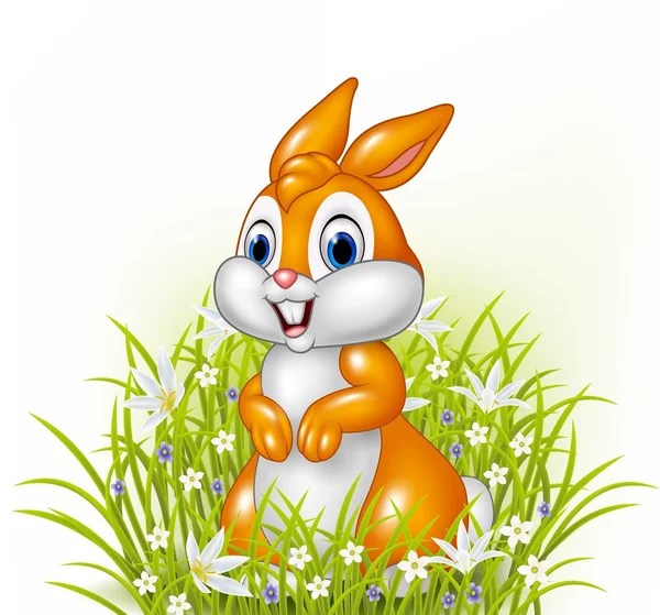 草の背景に漫画のウサギ — ストックベクタ
