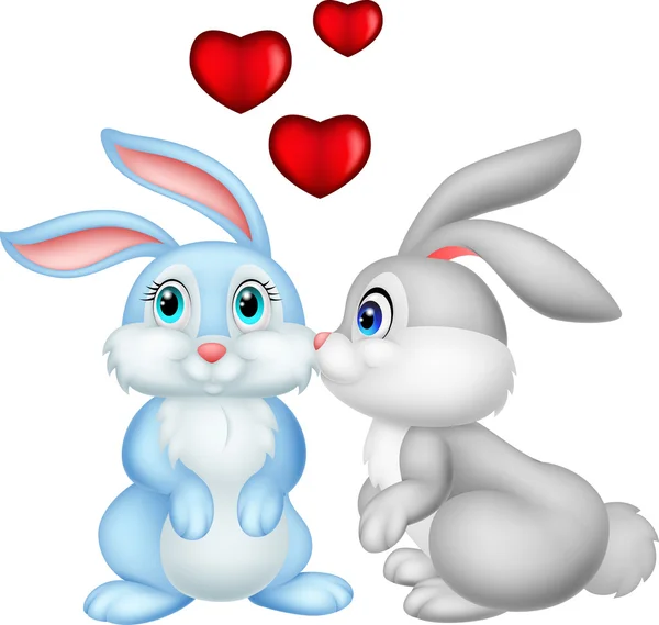 Twee schattige konijntjes verliefd cartoon — Stockvector