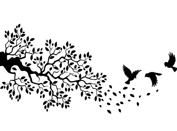 Tree silhouette with birds flying