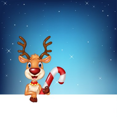 Boş oturum ve Noel candy bir gece gökyüzü arka plan üzerinde tutarak sevimli geyik