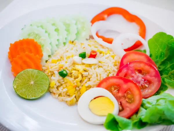 Fried rice with vegetable salad — Stock Photo, Image