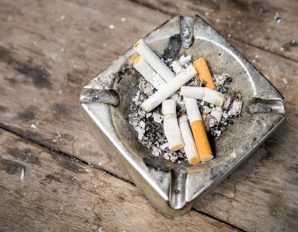 Cigarette butts in the tray — Stock Photo, Image