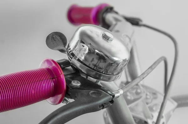 Bell on handlebar of cycle — Stockfoto