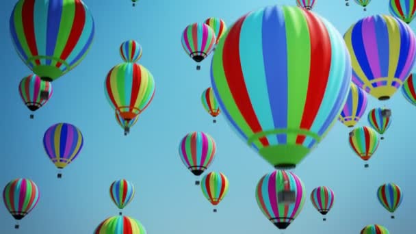 Mångfärgade varmluftsballonger flyger i blå himmel — Stockvideo