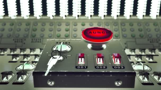 Red button marked Launch  on a control console — Stock Video