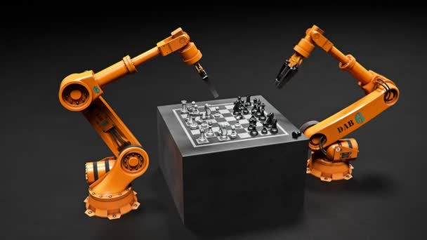 Dvě montážní robotické paže, hrají šachy