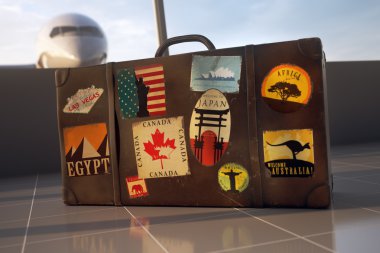 Eski kahverengi seyahat bavul. Gezi Bagaj etiketleri