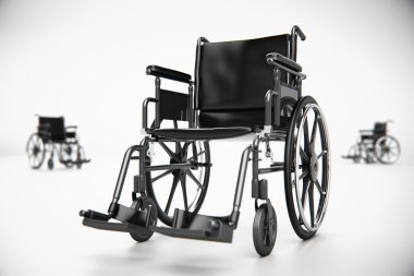 Boş odada tekerlekli sandalye.