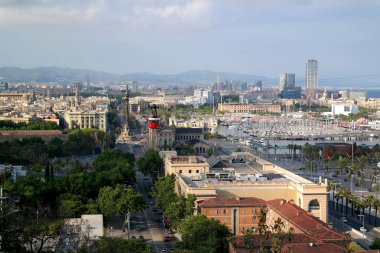 Barcelona, Spain - May 17, 2014: The cable car to the top of the hill of Montjuic.
