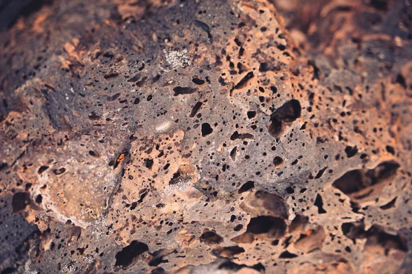 Close up detail of volcanic lava rock basalt found in the desert