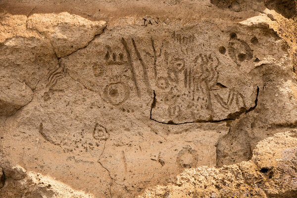 Native Modoc petroglyphs carved in stone at Petroglyph Point, Lava Beds NM