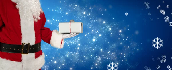 Cartão Saudação Natal Com Papai Noel Segurando Presente Sua Mão — Fotografia de Stock