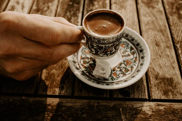 Hand Holding Cup Traditional Turkish Coffee Wooden Table Stock Photo