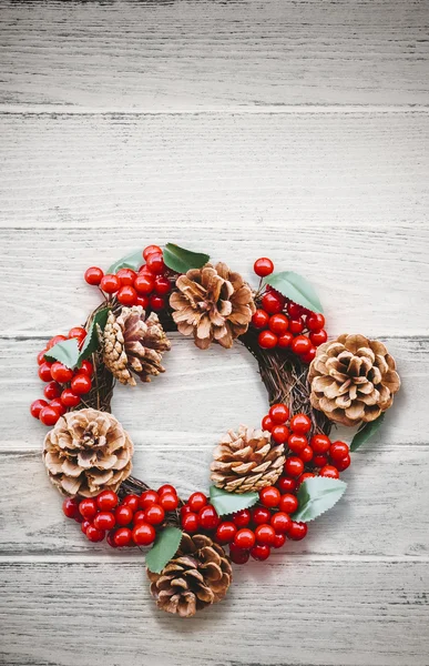 Christmas wreath on white wooden background — Stock Photo, Image