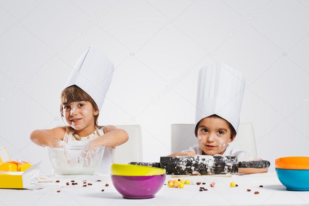 Children playing in the kitchen