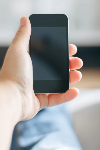 Hand holding smart mobile phone — Stock Photo, Image