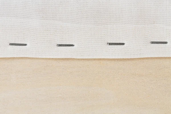 Zszywaj po tkaniny na drewnianej ramie — Zdjęcie stockowe
