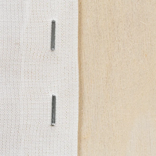 Zszywaj po tkaniny na drewnianej ramie — Zdjęcie stockowe