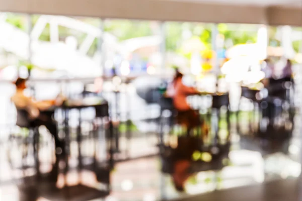 Blurred people in coffee shop — Stock Photo, Image