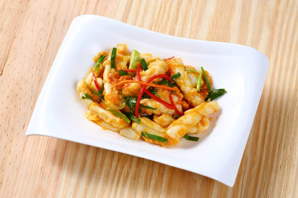 Stir fried squid with salted egg yolk — Stock Photo, Image