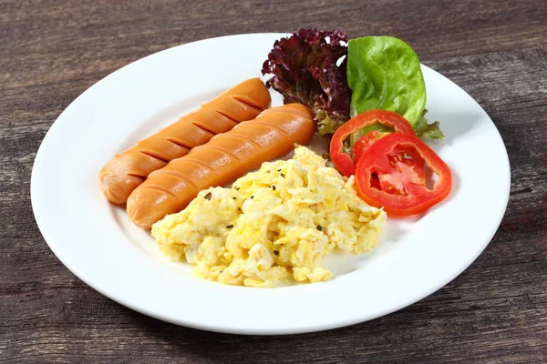 Sausages and scrambled egg — Stock Photo, Image