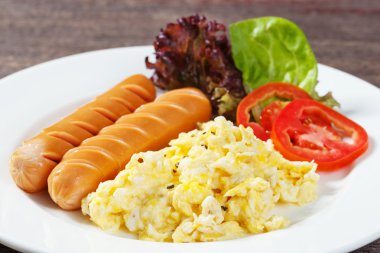 Sausages and scrambled egg clipart