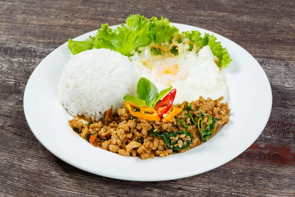 Rice topped with stir fried minced pork and basil — Stock Photo, Image