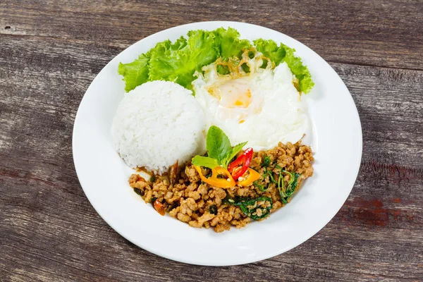 Rice topped with stir fried minced pork and basil — Stock Photo, Image
