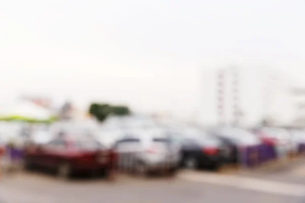 Abstract blurred car in parking lot — Stock Photo, Image