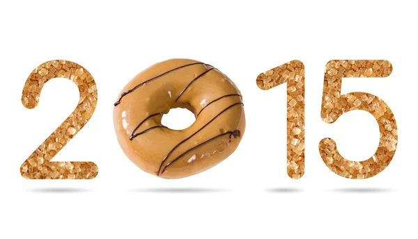 2015 numeric from natural sugar and donut topped by coffee cream — Stock Photo, Image