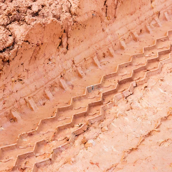 Tire track on lateritic soil — Stock Photo, Image