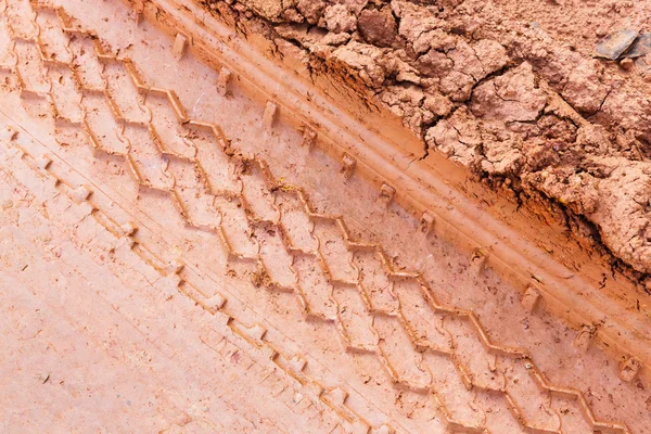 Tire track on lateritic soil — Stock Photo, Image