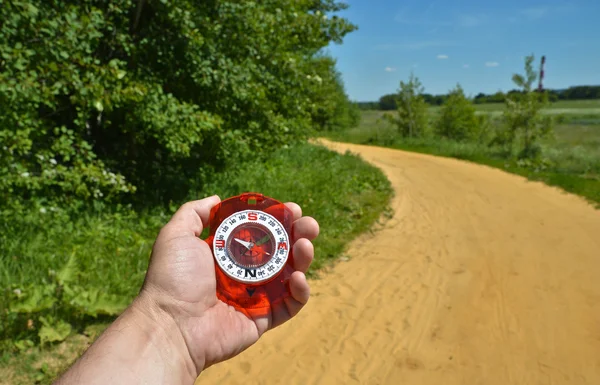 Compass in hand. — Stock Photo, Image