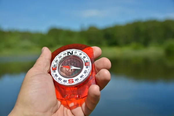 Compass in hand. — Stock Photo, Image