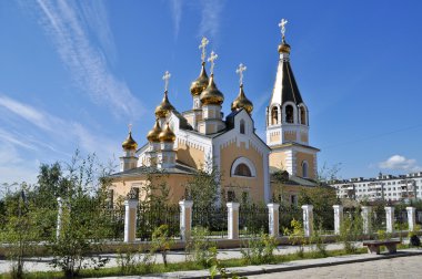 Orthodox temple on the background of blue sky. clipart