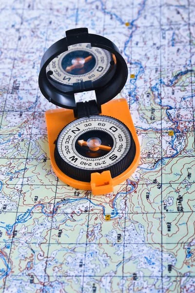 The magnetic compass and topographic map. — Stock Photo, Image