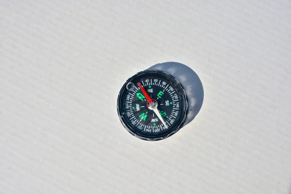 Magnetic compass on a white background. — Stock Photo, Image