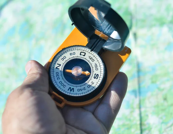 Compass in hand. — Stock Photo, Image