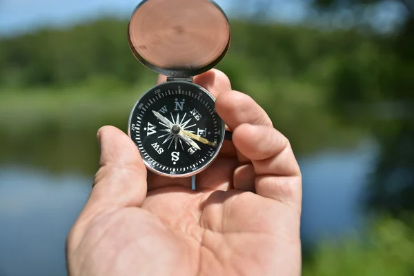 Compass in hand. — Stock Photo, Image