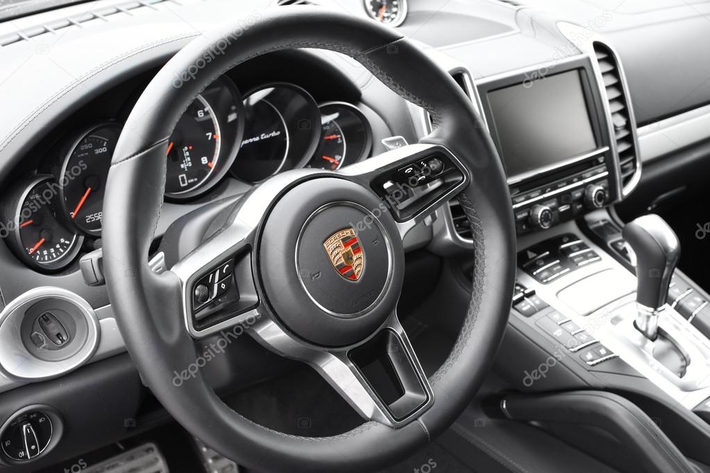 Black exclusive leather interior of a 2016 Porsche Cayenne Turbo SUV