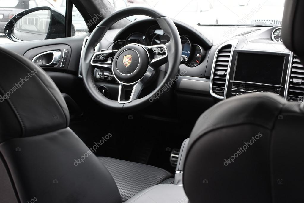 Black exclusive leather interior of a 2016 Porsche Cayenne Turbo SUV