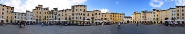 LUCCA, ITALY - APRIL 16,2014: famous Piazza Santa Maria in Lucca, Tuscany, central Italy clipart