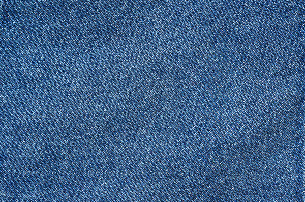 Flat classic vintage blue jeans texture. Space for text, lettering, copy.