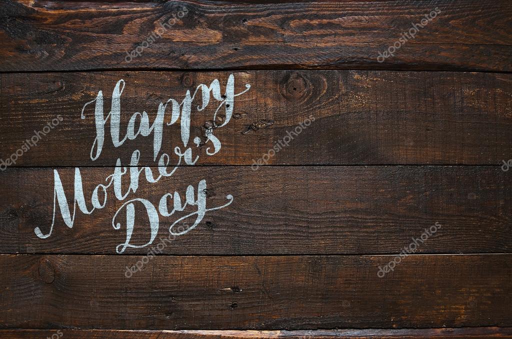 Happy Mothers Day Lettering Calligraphy On Dark Rustic Barn Wood Holiday Background Space For Text Happy Mothers Day Lettering Calligraphy On Dark Rustic Barn Wood Holiday Background Space For Text
