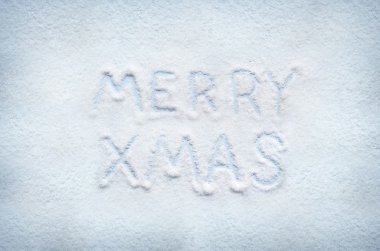 Metin neşeli Noel kar üzerinde yazılı